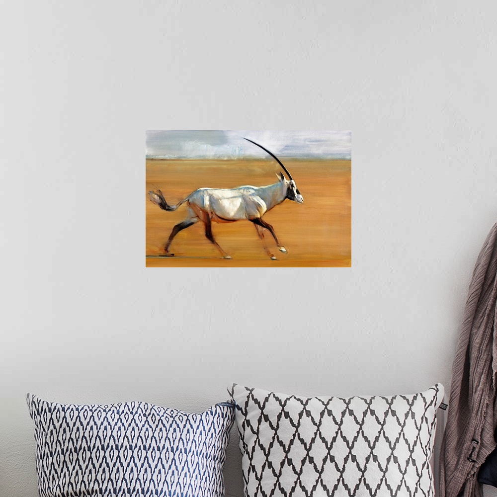 A bohemian room featuring Contemporary wildlife painting of an Oryx running in the desert.