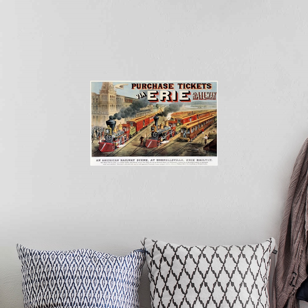A bohemian room featuring Vintage poster of two trains pulling out of the station which is viewed to the left.