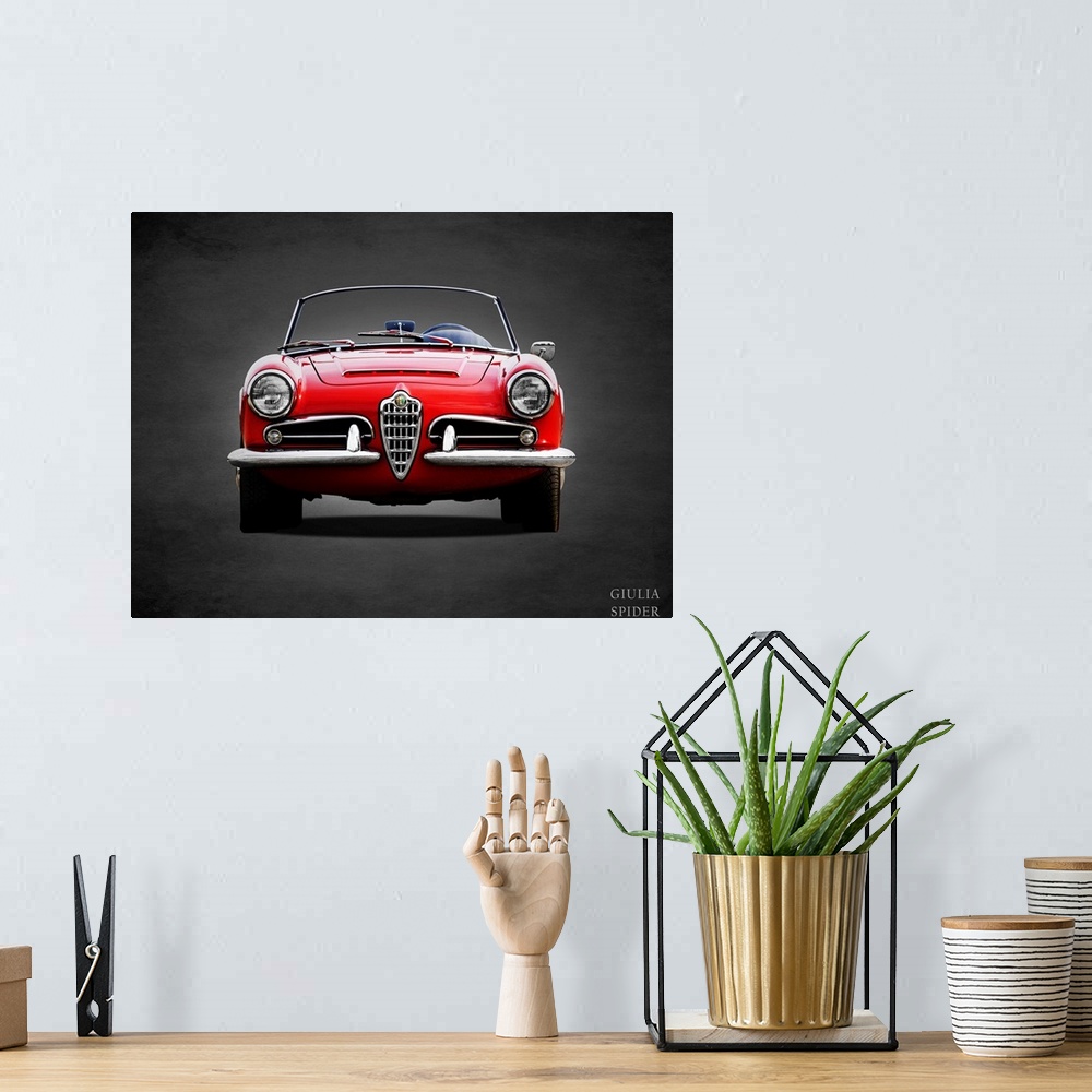 A bohemian room featuring Photograph of a red 1964 Alfa Giulia 1600 Spider printed on a black background with a dark vignette.