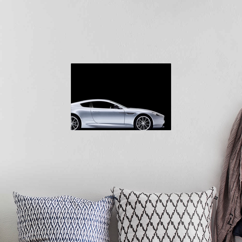 A bohemian room featuring Aston-Martin DB9