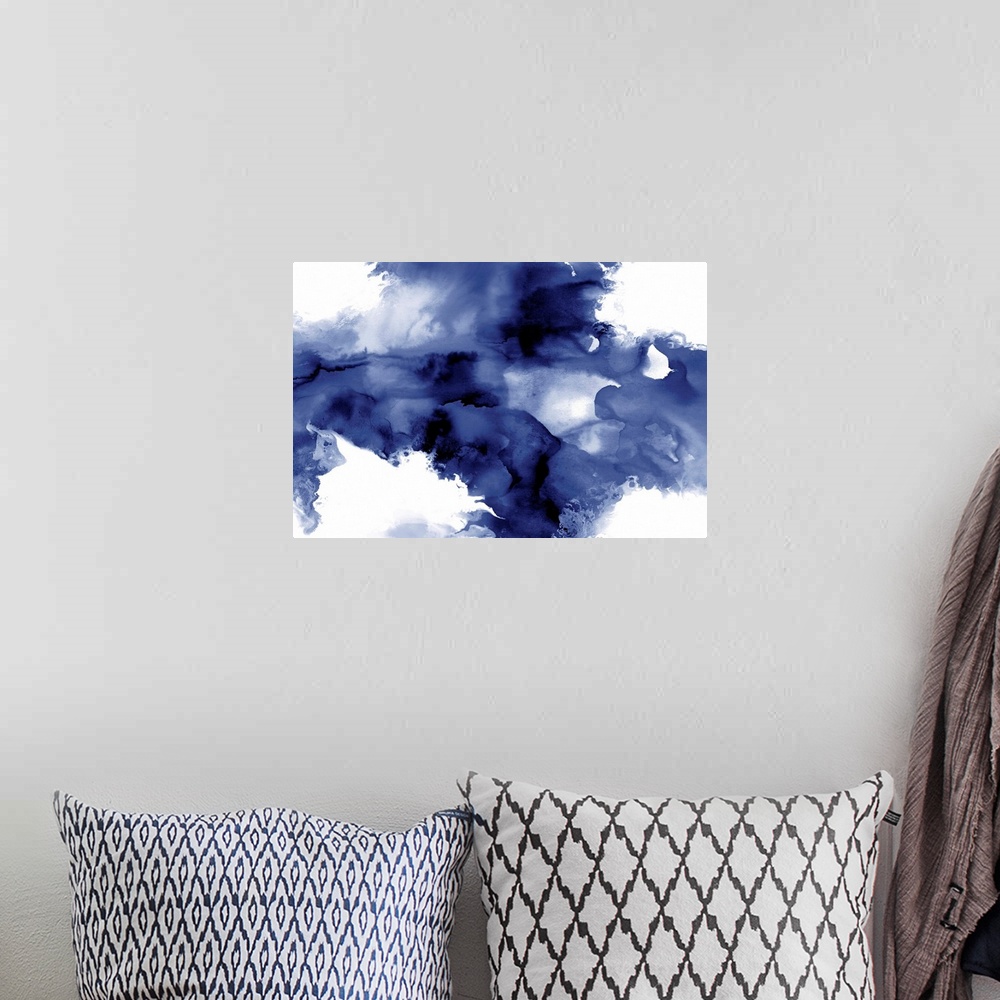 A bohemian room featuring Abstract watercolor painting with indigo splotches on a white background.