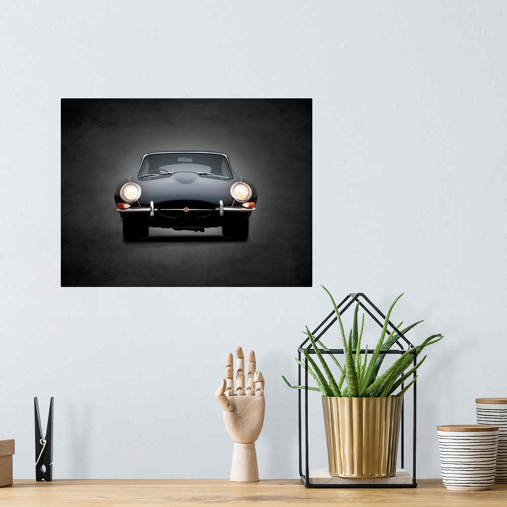 A bohemian room featuring Photograph of a black E-Type printed on a black background with a dark vignette.