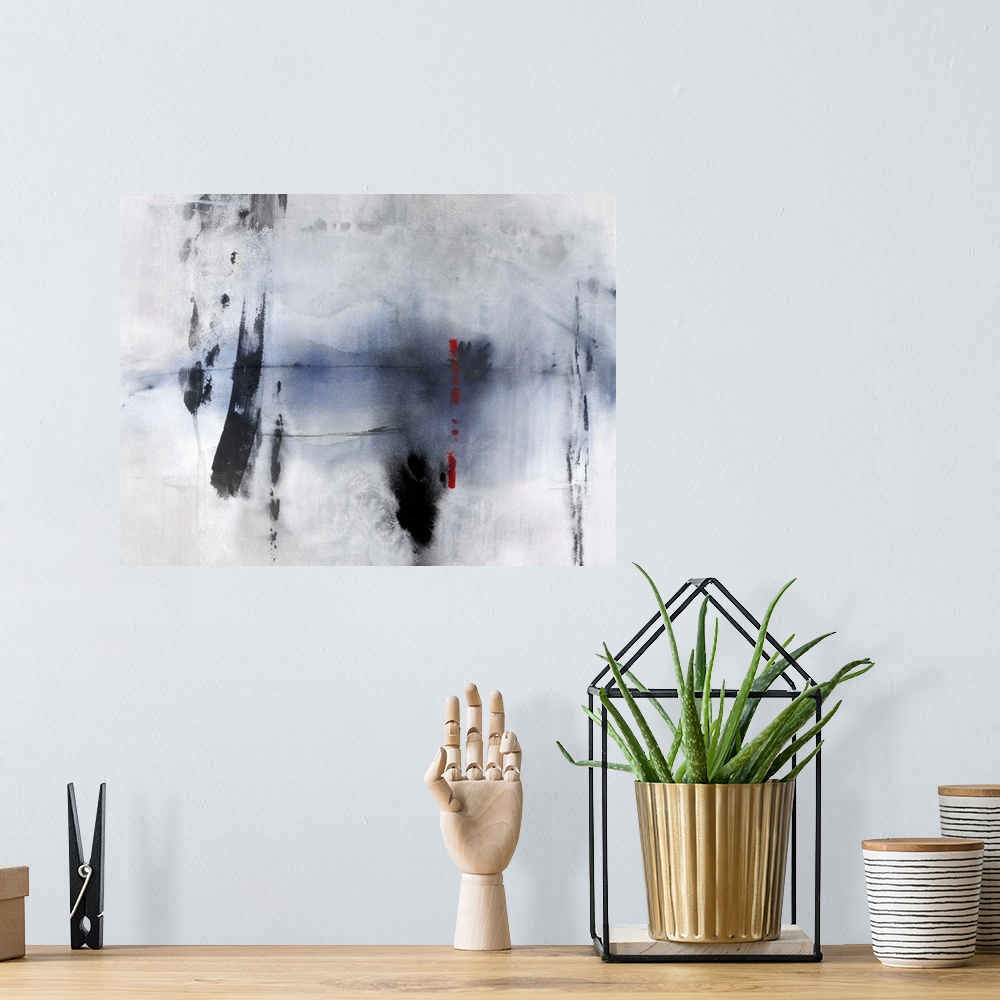 A bohemian room featuring Large abstract painting with a faded background, indigo center, bold black brushstrokes on top, a...