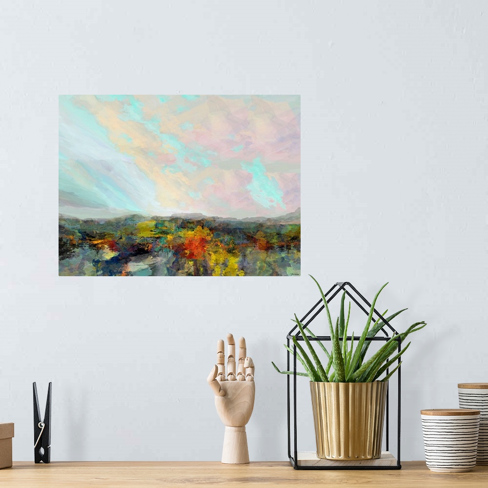 A bohemian room featuring Abstract artwork with a colorful hilly landscape and a pastel sky.