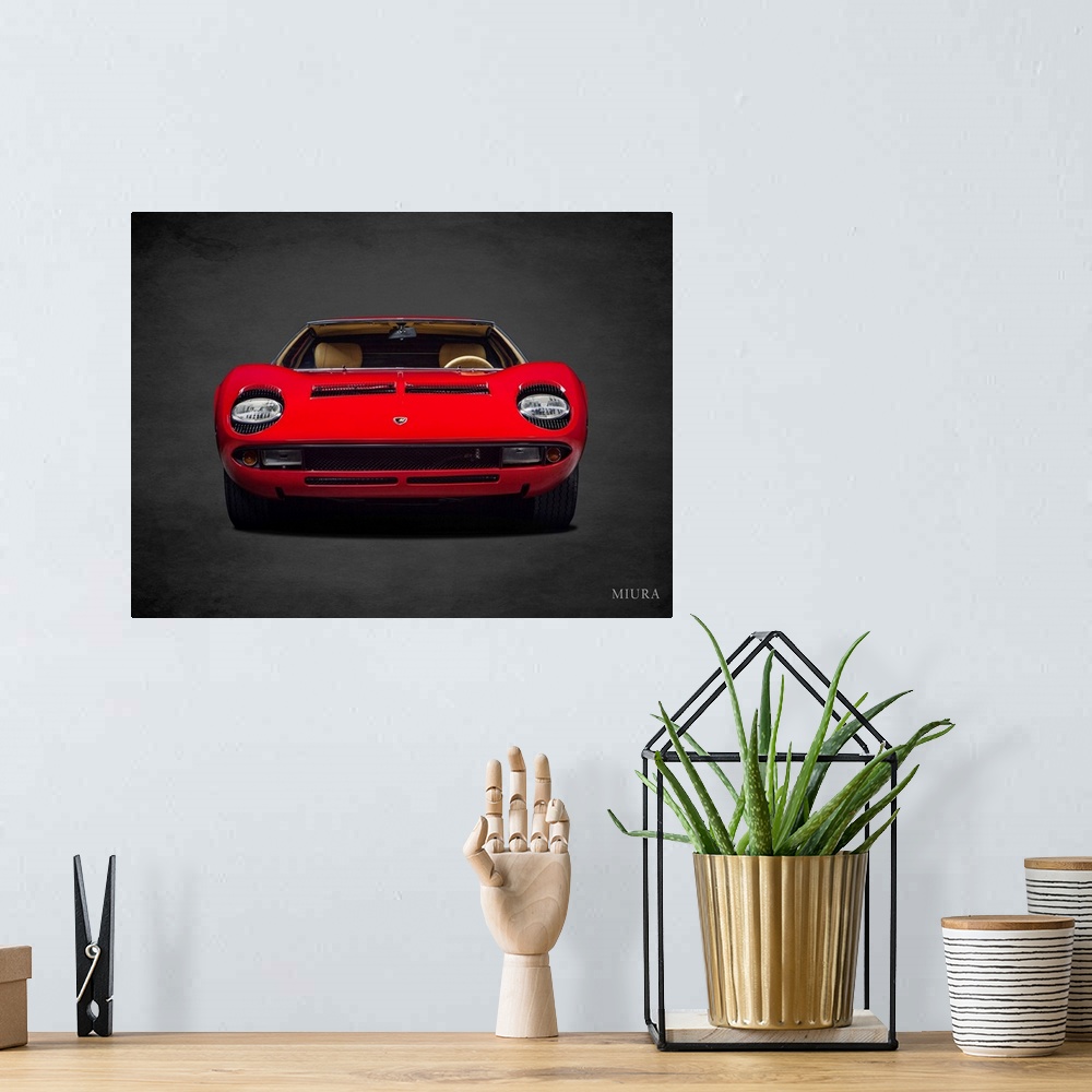 A bohemian room featuring Photograph of a red Lamborghini Miura printed on a black background with a dark vignette.