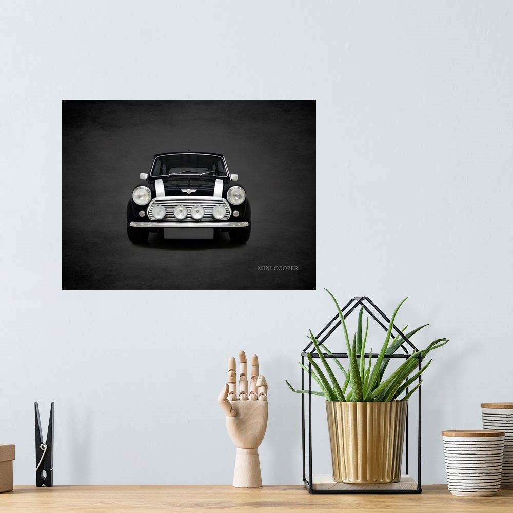 A bohemian room featuring Photograph of a black 2001 Mini Cooper with white stripes printed on a black background with a da...