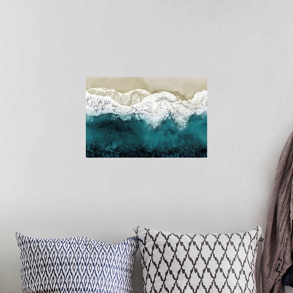 A bohemian room featuring One artwork in a series of aerial shots of a beach as teal waves break upon the shore.