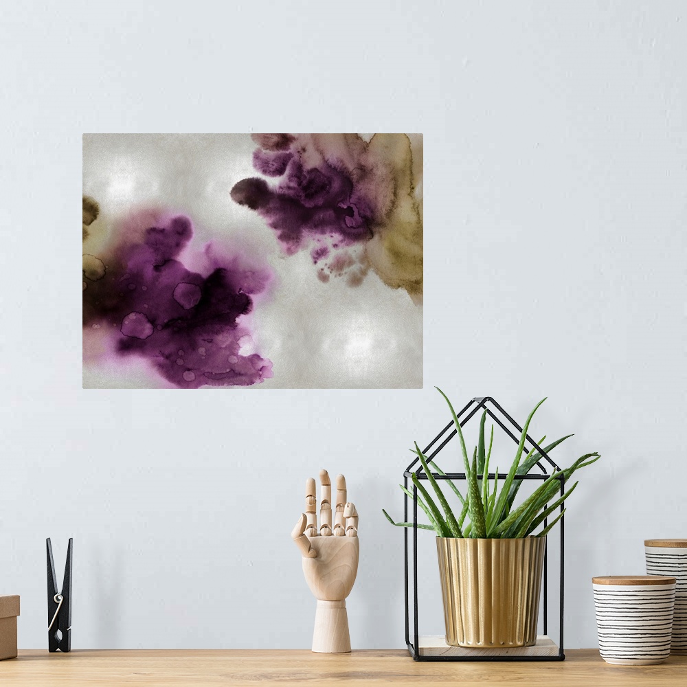 A bohemian room featuring Abstract painting with deep purple and gold hues splattered together on a silver background.