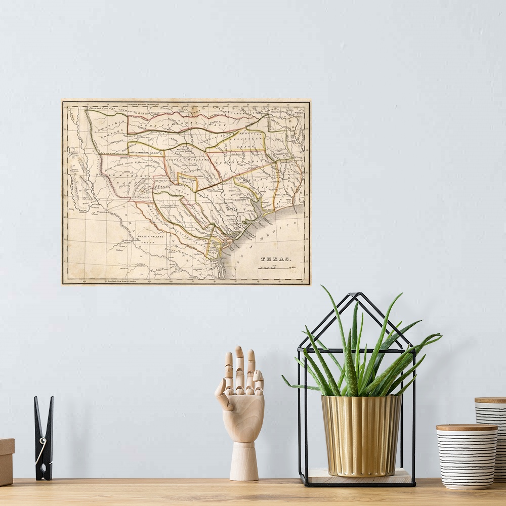 A bohemian room featuring Antique historical map of Texas with highlighted boarders.