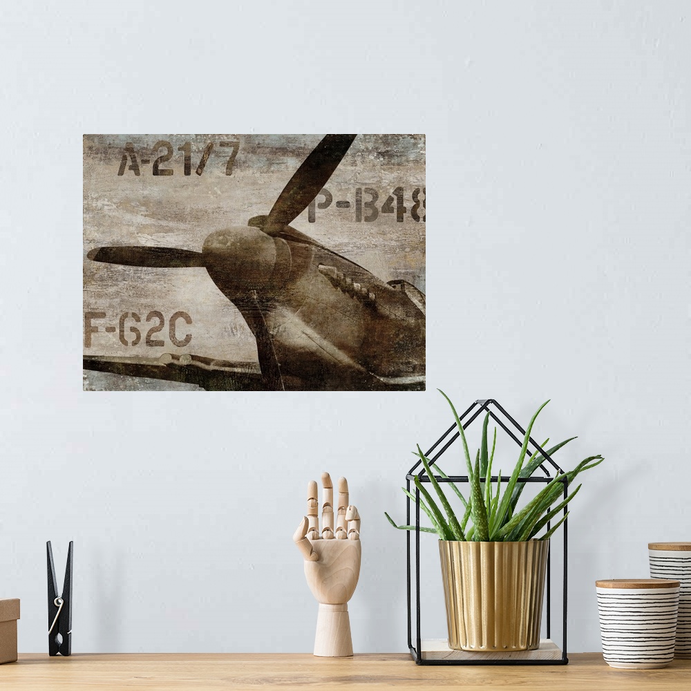 A bohemian room featuring Vintage decor with an illustration of an old airplane propeller in dark sepia tones.