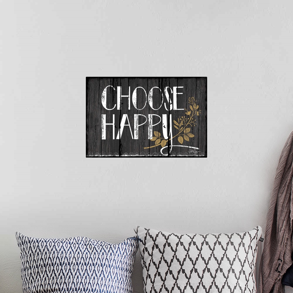 A bohemian room featuring Font-driven sign art conveys a wonderful sentiment about happiness, "Choose Happy"