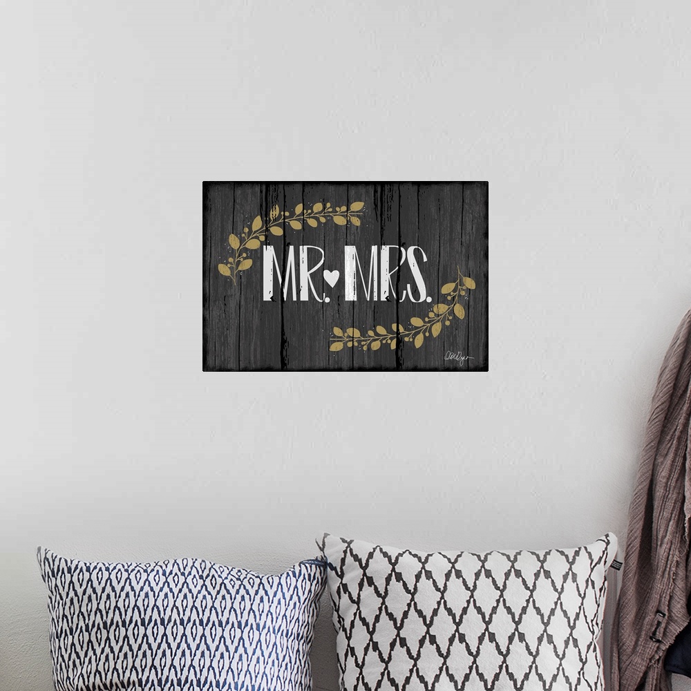 A bohemian room featuring Font-driven sign art conveys a wonderful sentiment about love and home, "Mr. and Mrs."