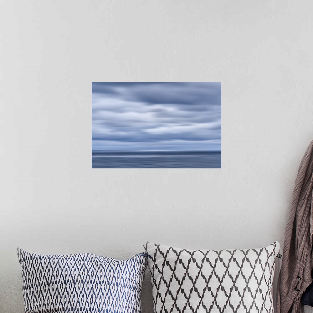 A bohemian room featuring USA, California, San Diego, View of blurred clouds over Pacific Ocean