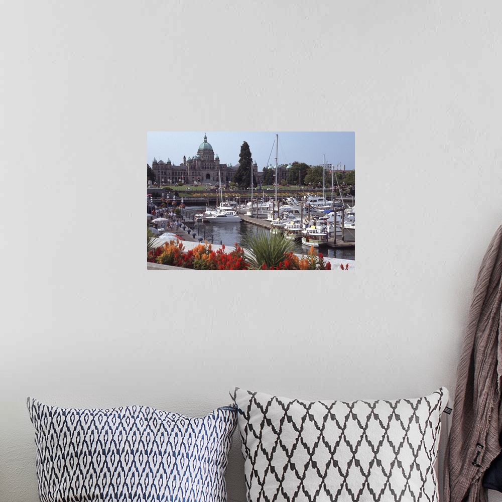 A bohemian room featuring Canada, British Columbia, Victoria.Parliament Building, with ships and docks in foreground