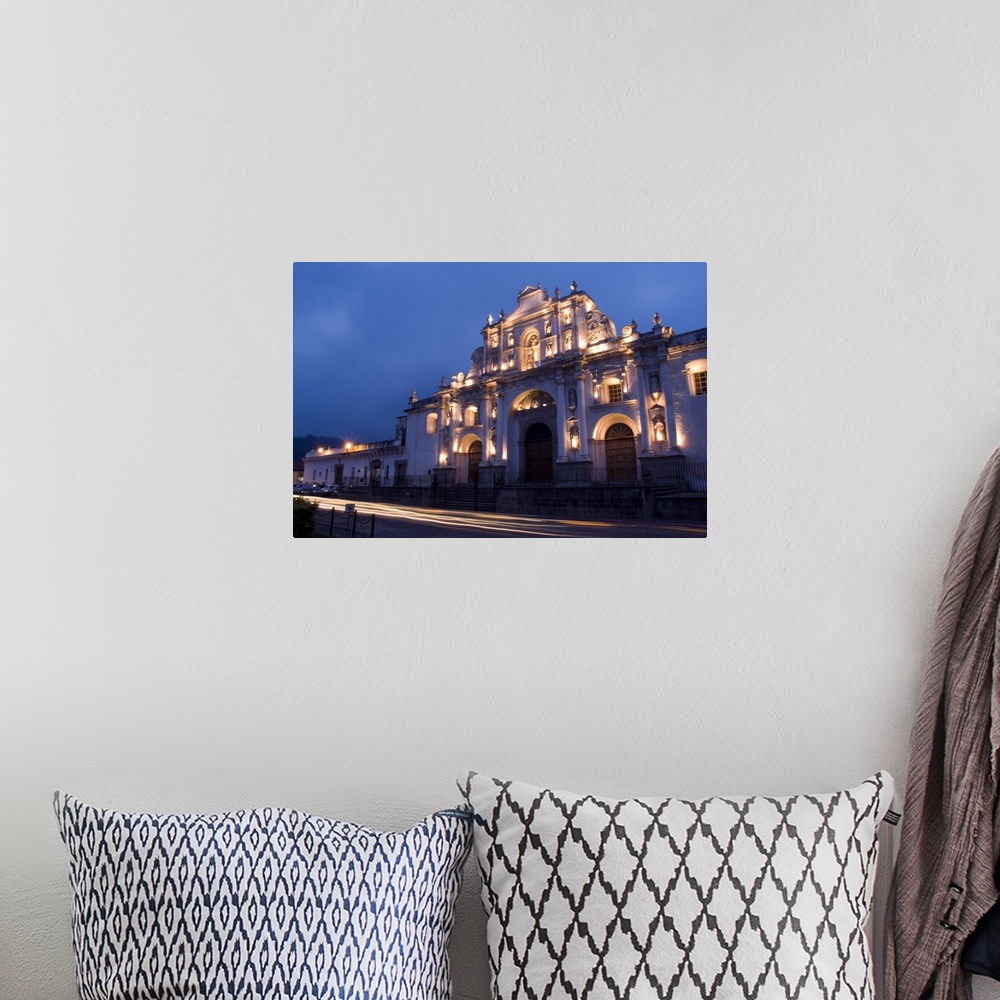 A bohemian room featuring Night photo of famous Cathedral de Santiago with twilight and streaks of traffic in the tourism t...
