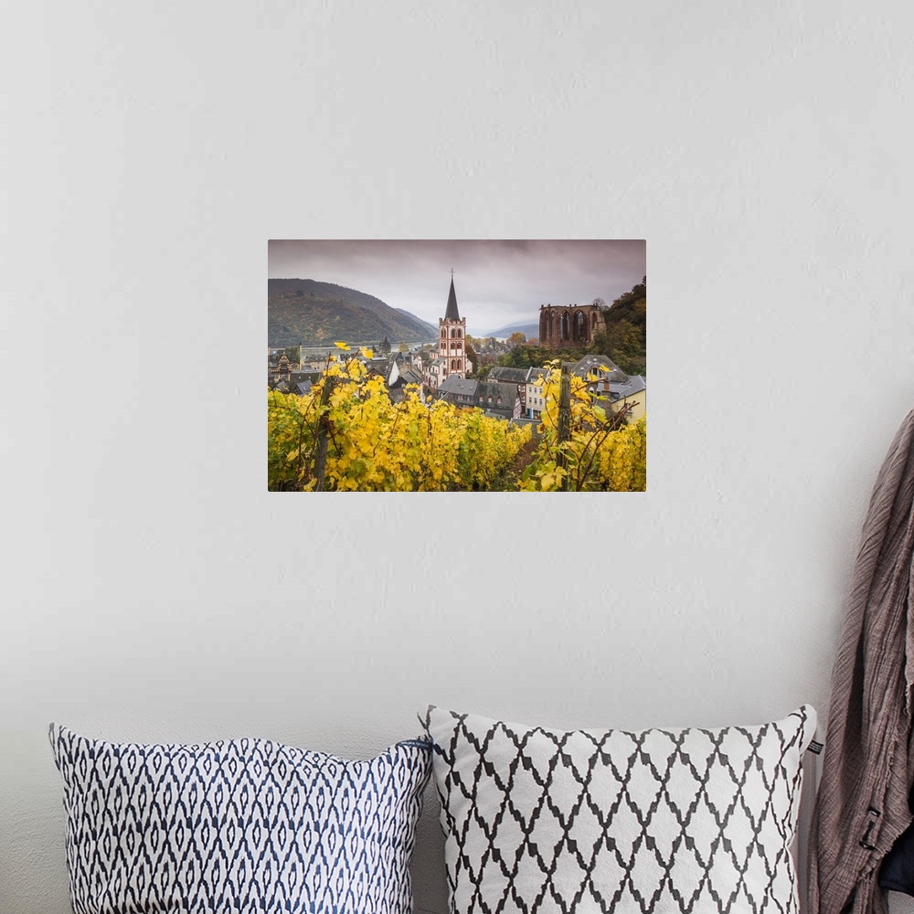 A bohemian room featuring Germany, Rhineland-Pfalz, Bacharach, elevated town view in autumn.