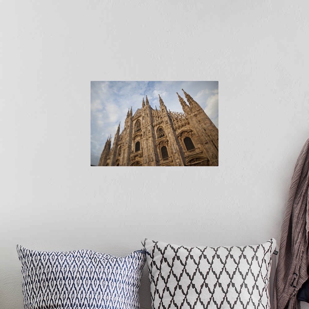 A bohemian room featuring ITALY, Milan Province, Milan. Milan Cathedral, evening.