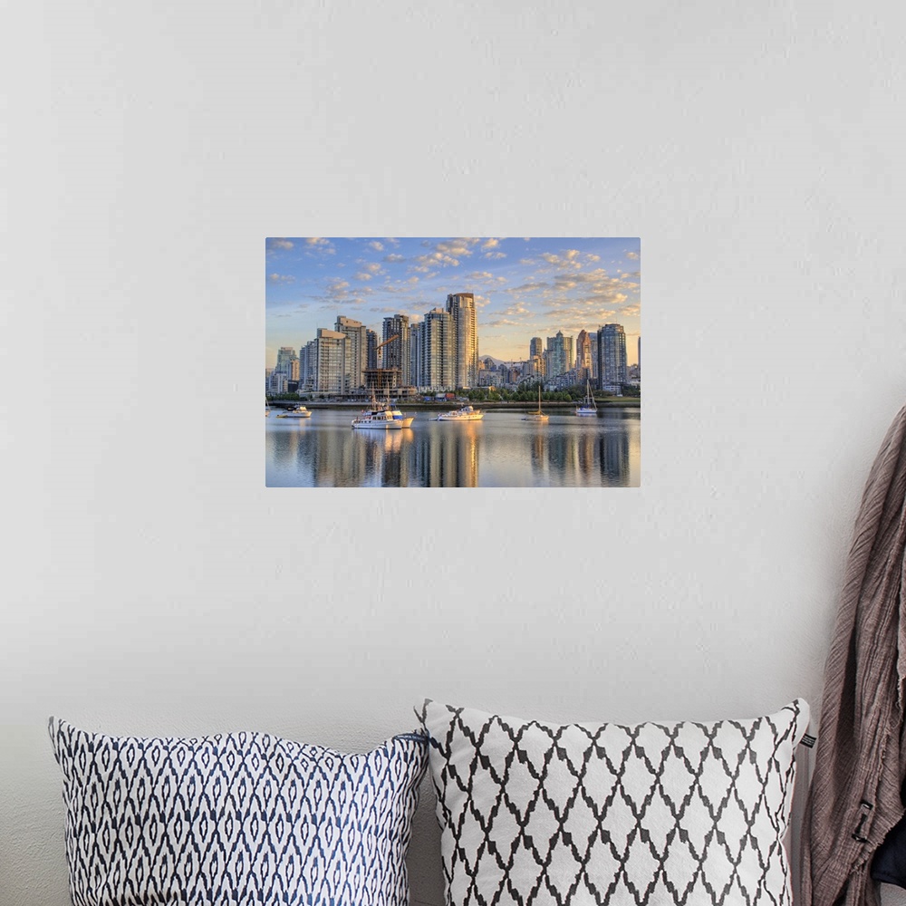A bohemian room featuring Looking across False Creek at the skyline of Vancouver British Columbia at sunrise