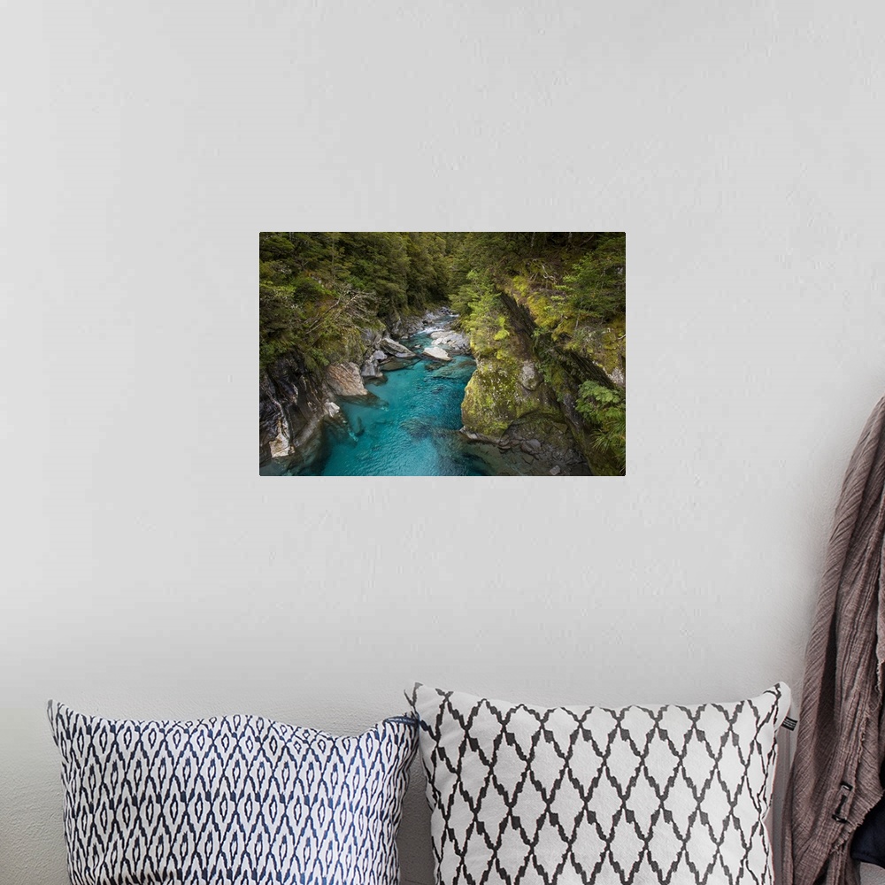 A bohemian room featuring Makarora, New Zealand. The Blue Pools of Makarora offer enticing blue waters to swim in.