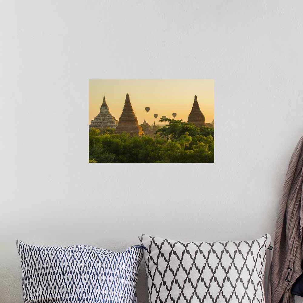 A bohemian room featuring Myanmar. Bagan. Hot air balloons rising over the temples of Bagan.