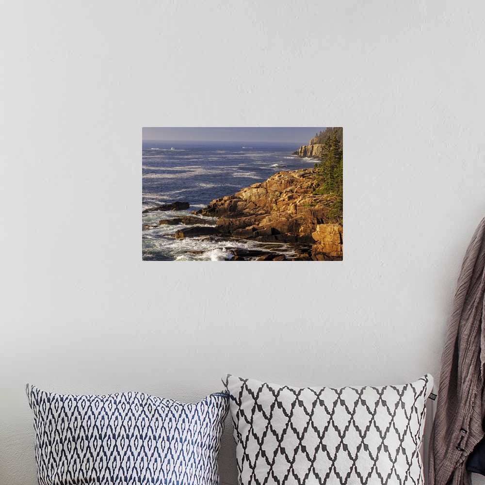 A bohemian room featuring Otter Cliffs at sunrise in Acadia National Park, Maine, USA.