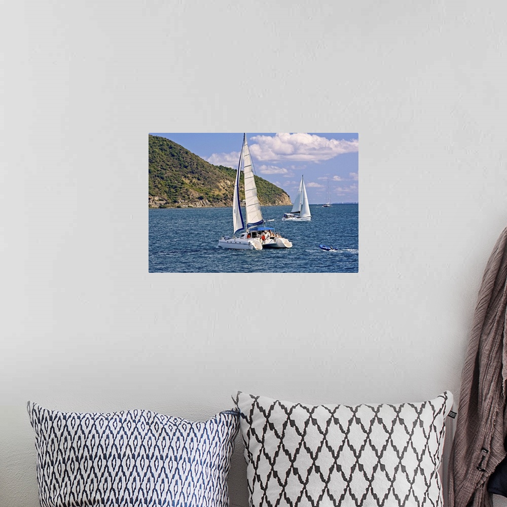 A bohemian room featuring AS scenic of Sail boats in Road Harbour, Road Town Tortola U. S. Virgin Islands
