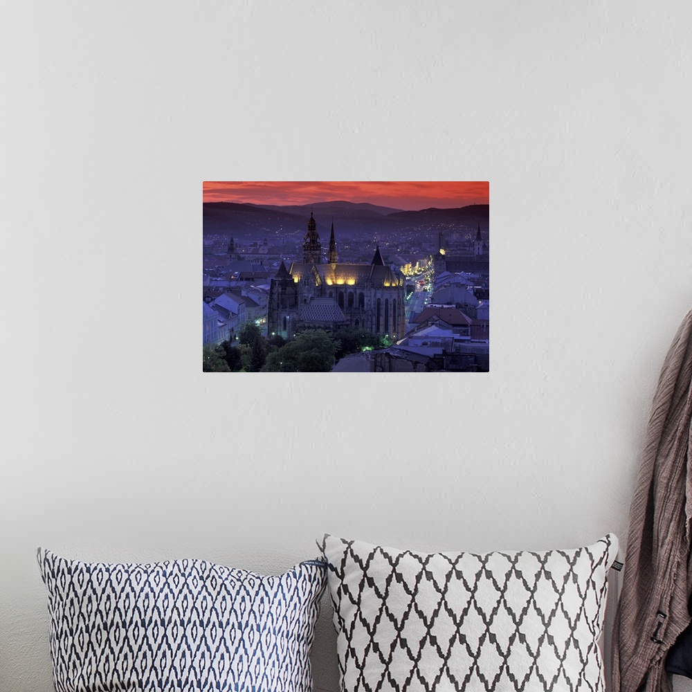 A bohemian room featuring Europe, Slovakia, Kosice. Cathedral of St. Elizabeth and town view at dusk