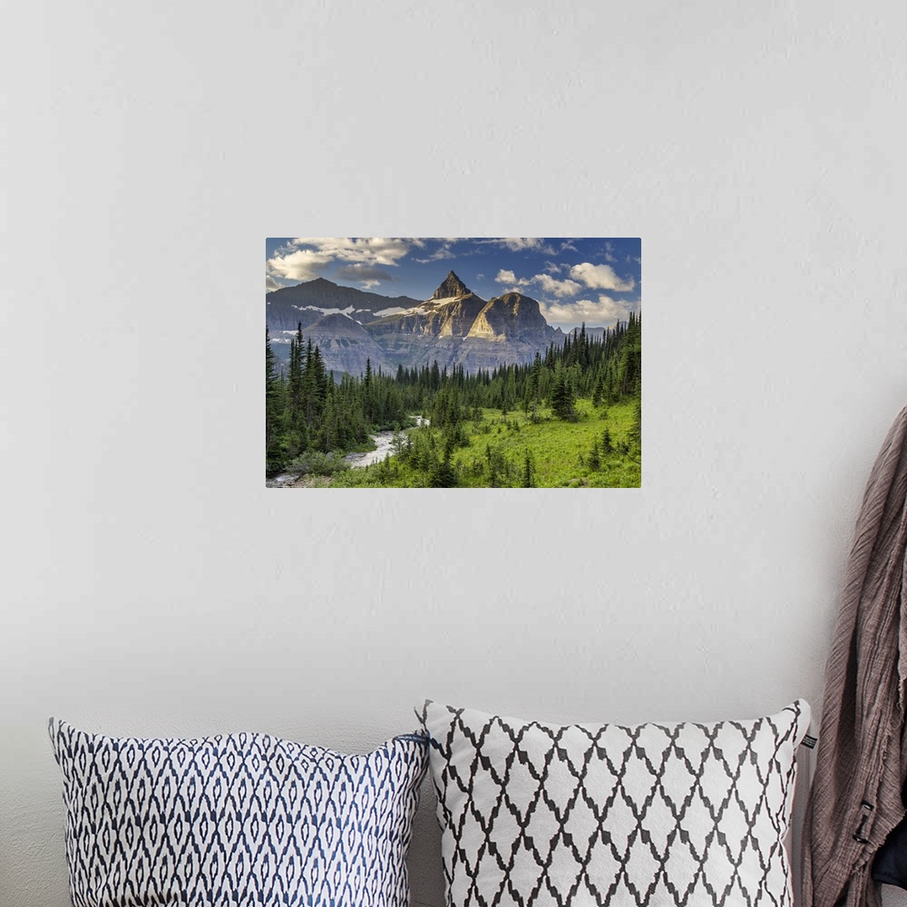 A bohemian room featuring Thunderbird Mountain over Hole in the Wall Creek in Glacier National Park, Montana, USA.