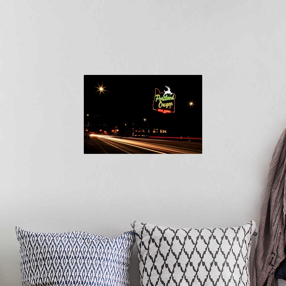 A bohemian room featuring USA, Oregon, Portland. Neon sign in Old Town and traffic blur.