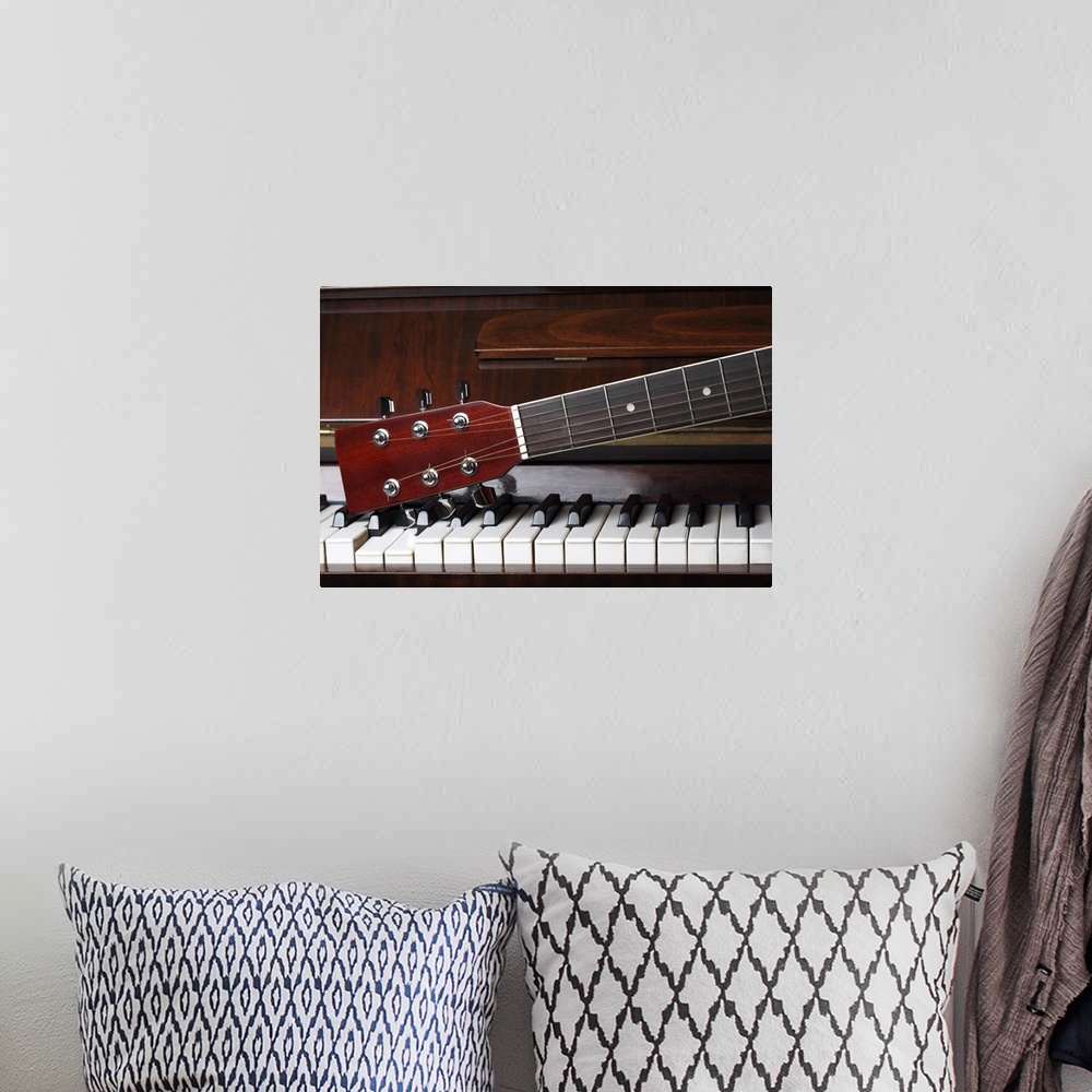 A bohemian room featuring Guitar Neck On Old Piano Keys