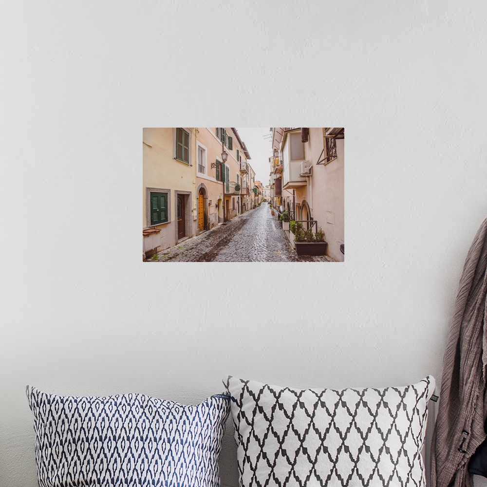 A bohemian room featuring Narrow Street With Buildings In Castel Gandolfo, Rome Suburb, Italy