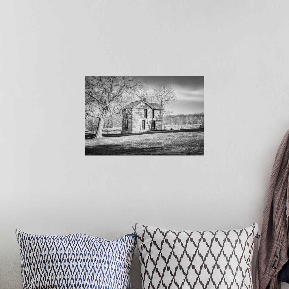 A bohemian room featuring Black and white image of an old homestead Harrison co. Ky.