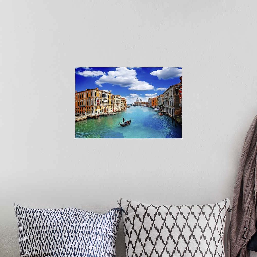 A bohemian room featuring Ancient buildings and gondola along canal grande in Venice Italy.