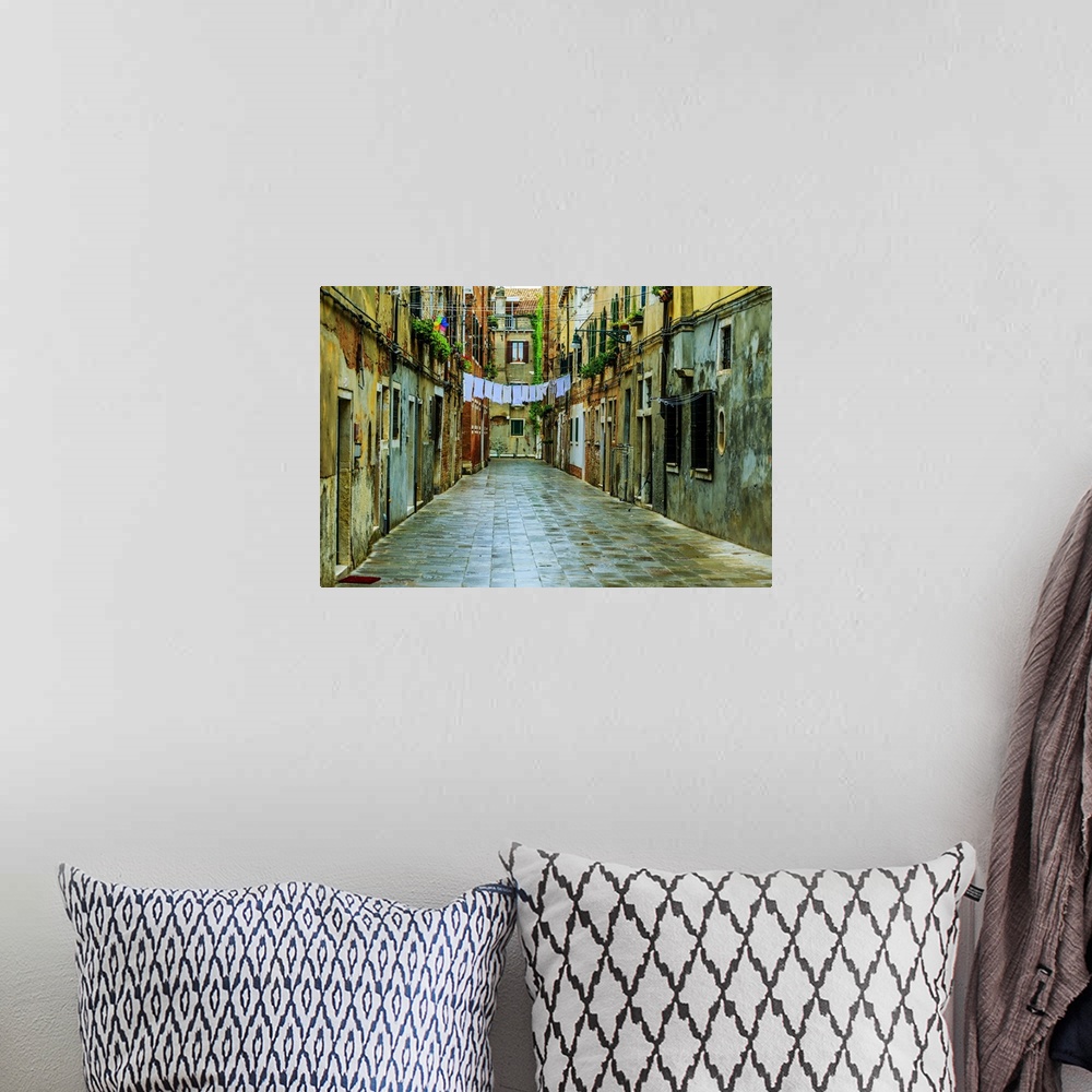 A bohemian room featuring Venice, Italy - old street and historic tenements.