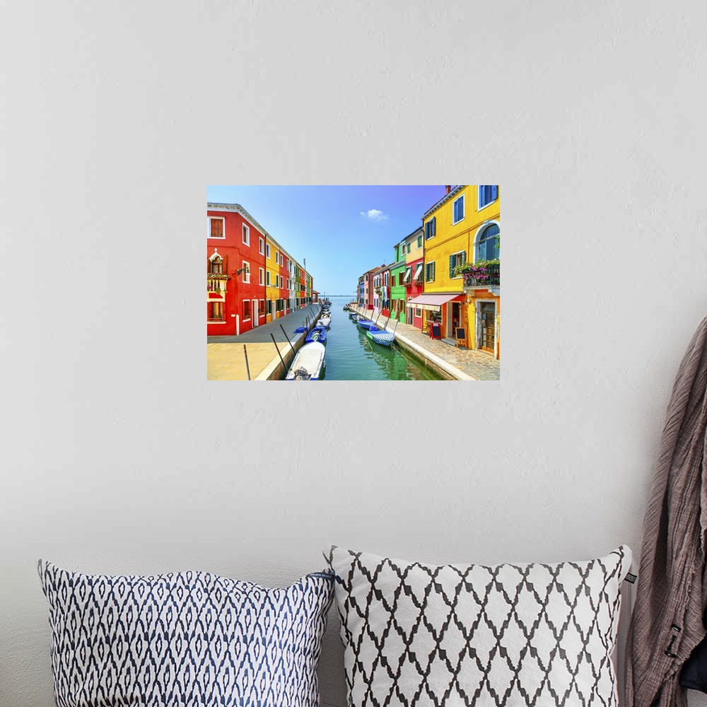 A bohemian room featuring Venice landmark, Burano island canal, colorful houses and boats, Italy. Long exposure photography.