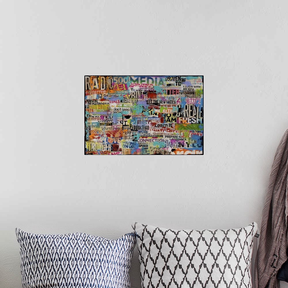 A bohemian room featuring Contemporary collage painting made of found lettering.