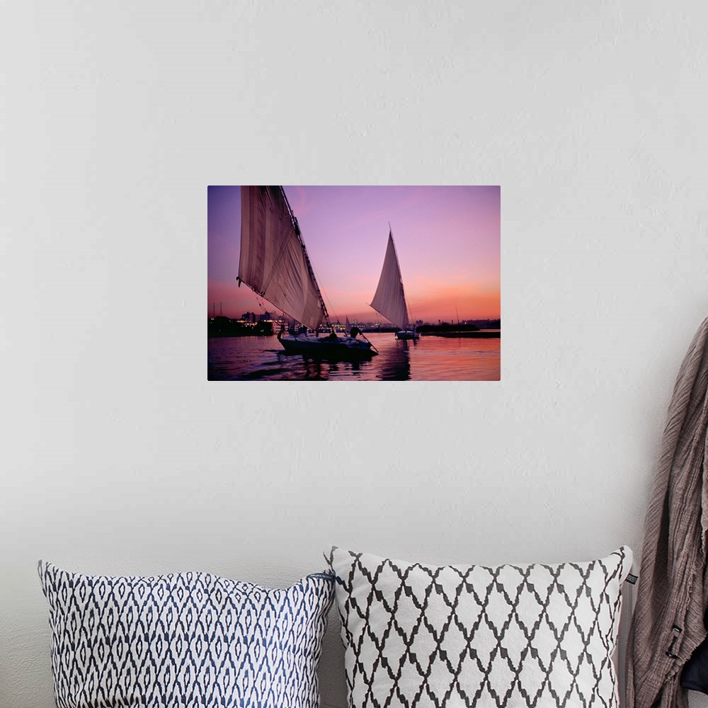 A bohemian room featuring Africa, Egypt, Aswan, Feluccas, (egyptian sailboat) (egyptian sailboat) on Nile river