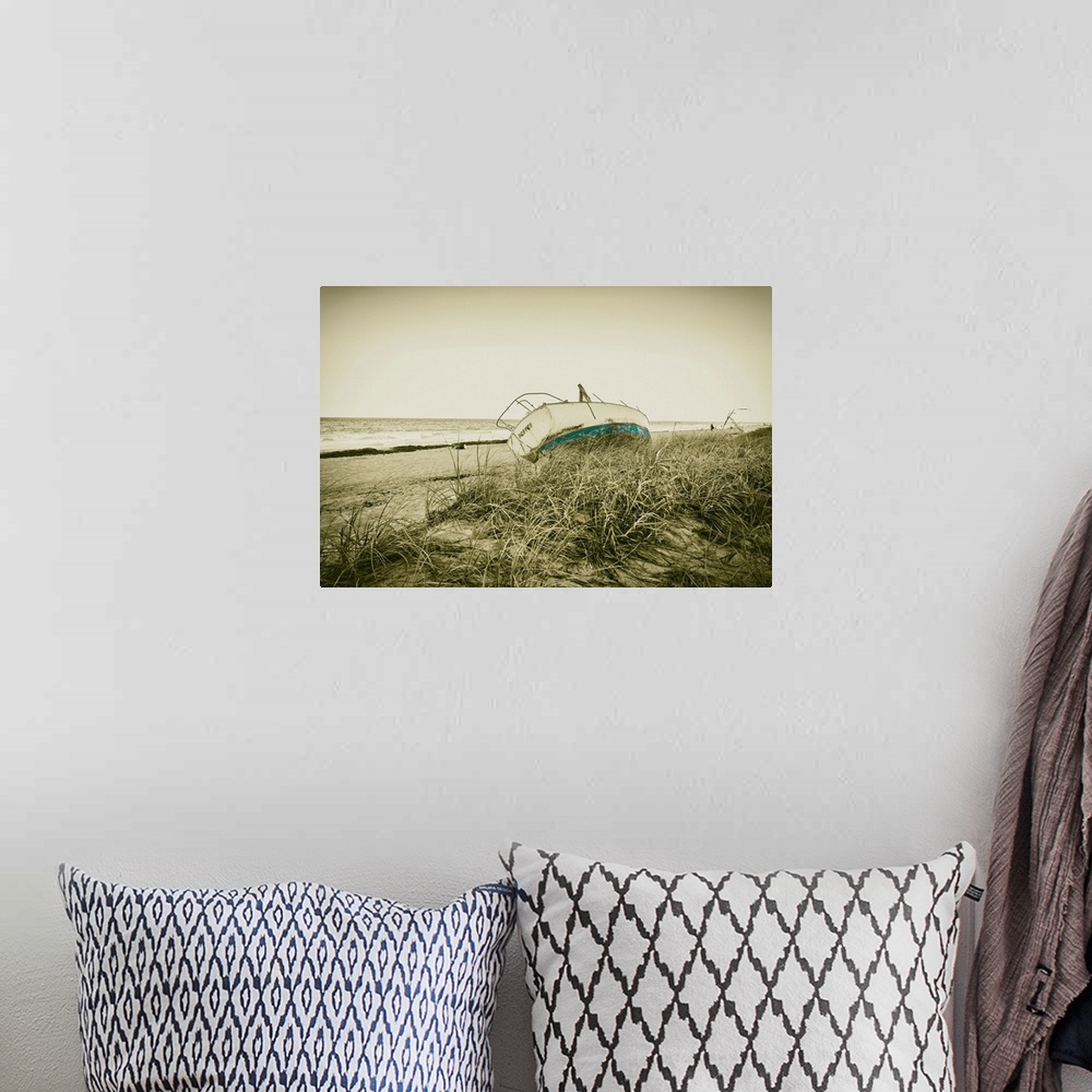 A bohemian room featuring Boat wreck on beach.