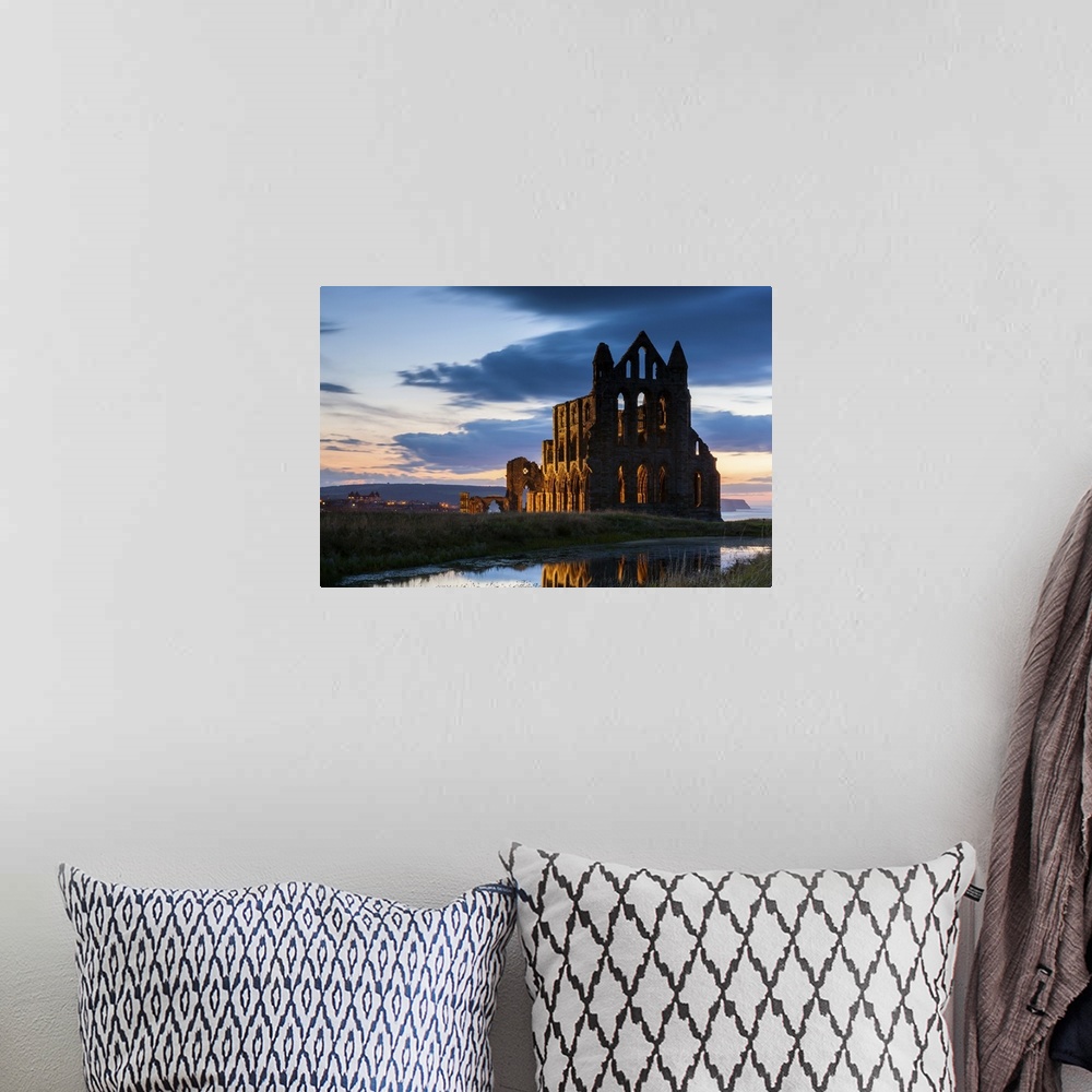 A bohemian room featuring UK, England, Great Britain, North Yorkshire, Whitby, Abbey at night.
