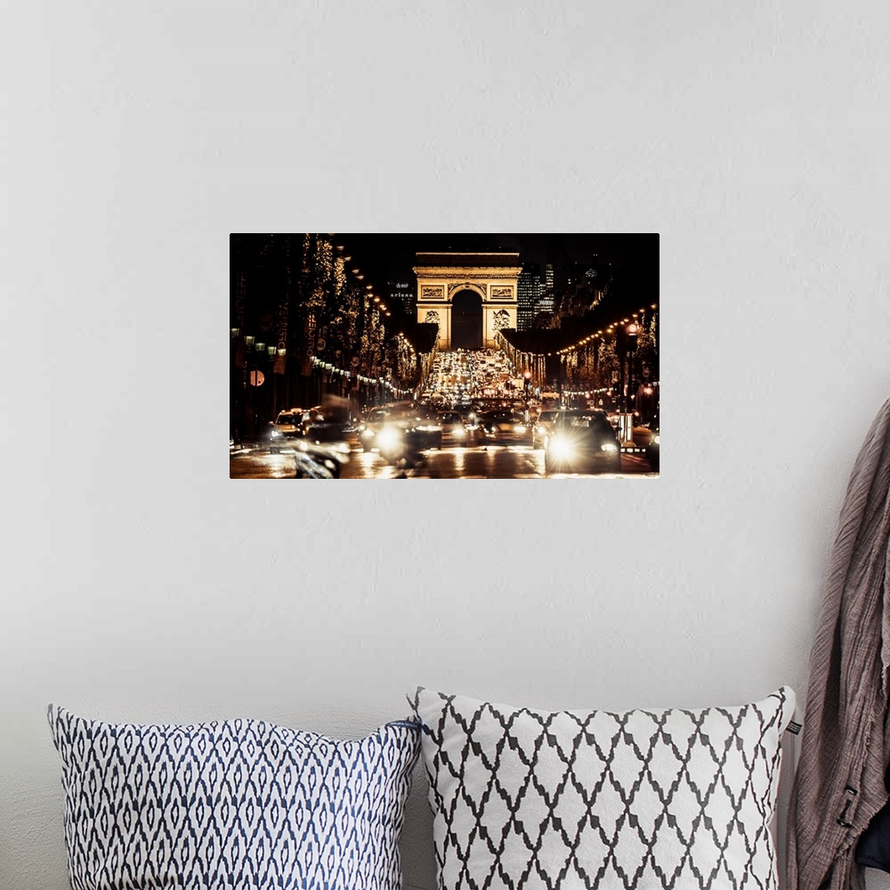 A bohemian room featuring France, Paris, Arc de Triomphe, The avenue Champs-elysees and the Arc de Triomphe at night.