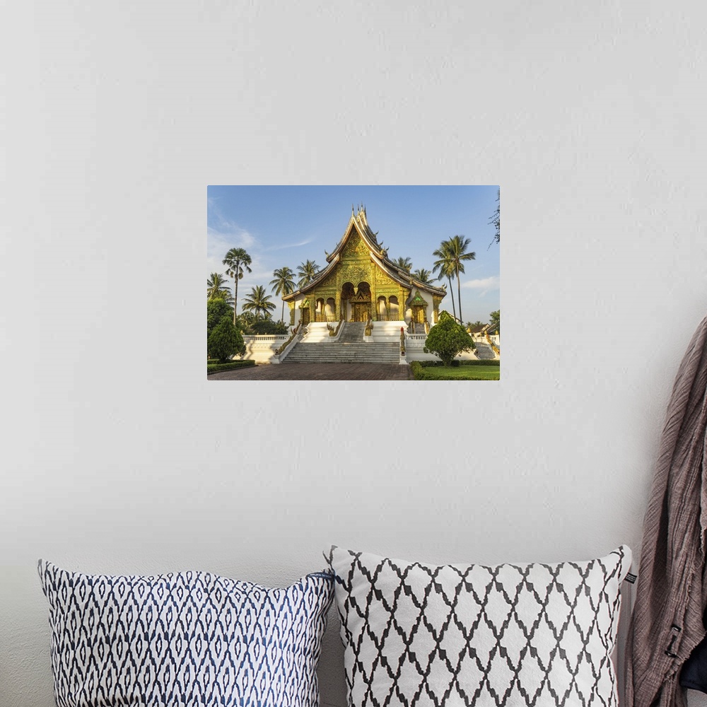 A bohemian room featuring Laos, North Region, Luang Prabang, The intricately adorned facade of Wat Haw Pha Bang temple in L...