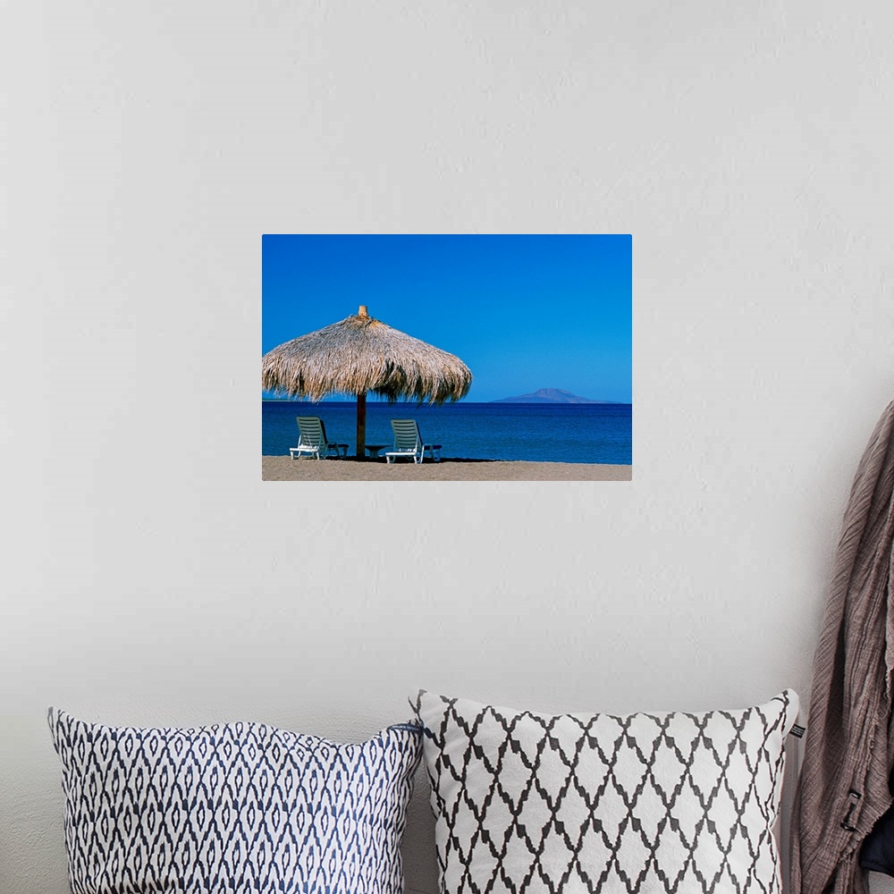 A bohemian room featuring Mexico, Baja California Sur, Sea of Cortez, beach umbrella and lounge chairs