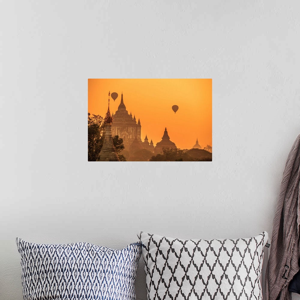 A bohemian room featuring Myanmar, Mandalay, Bagan, Hot air balloons over Gawdawpalin Temple at sunrise. This is the second...