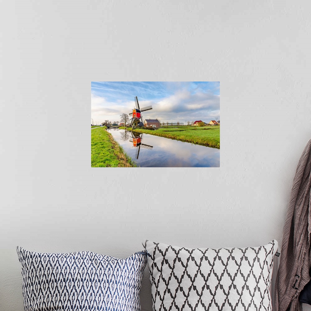 A bohemian room featuring Netherlands, North Holland, Benelux, Hoorn, Windmill on a thatched house in the countryside.