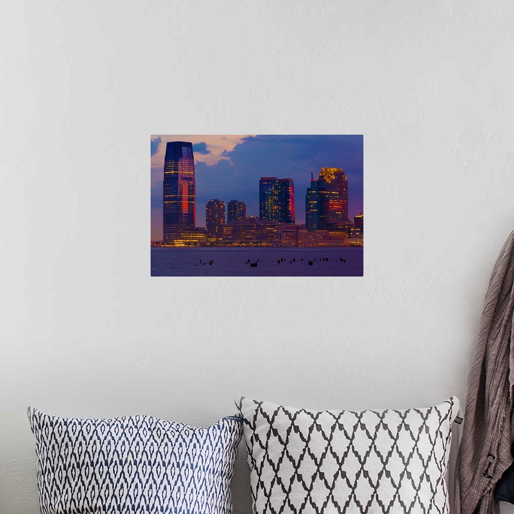 A bohemian room featuring USA, New Jersey, Hudson, View from Manhattan in the evening.