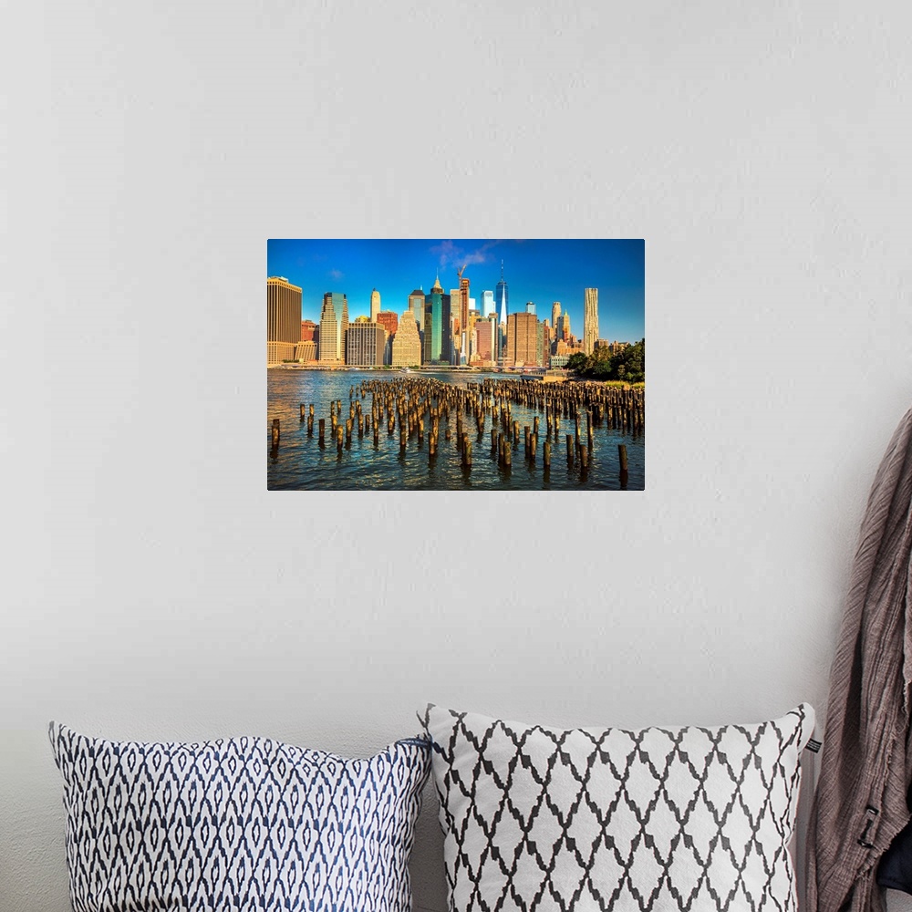 A bohemian room featuring New York City, Brooklyn, Brooklyn Bridge Park, wooden piles, Lower Manhattan Financial District s...