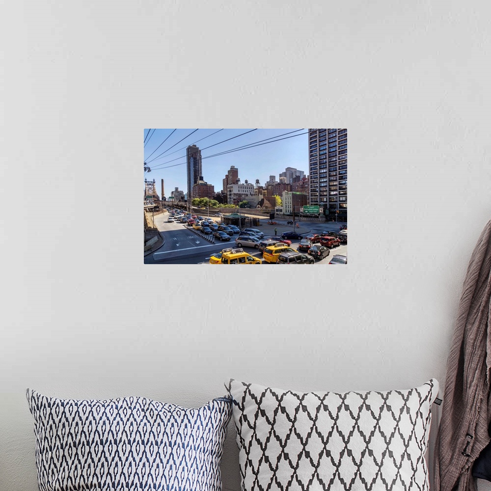 A bohemian room featuring New York, NYC, Manhattan, Queensboro Bridge Traffic viewed from Roosevelt Island Tram.