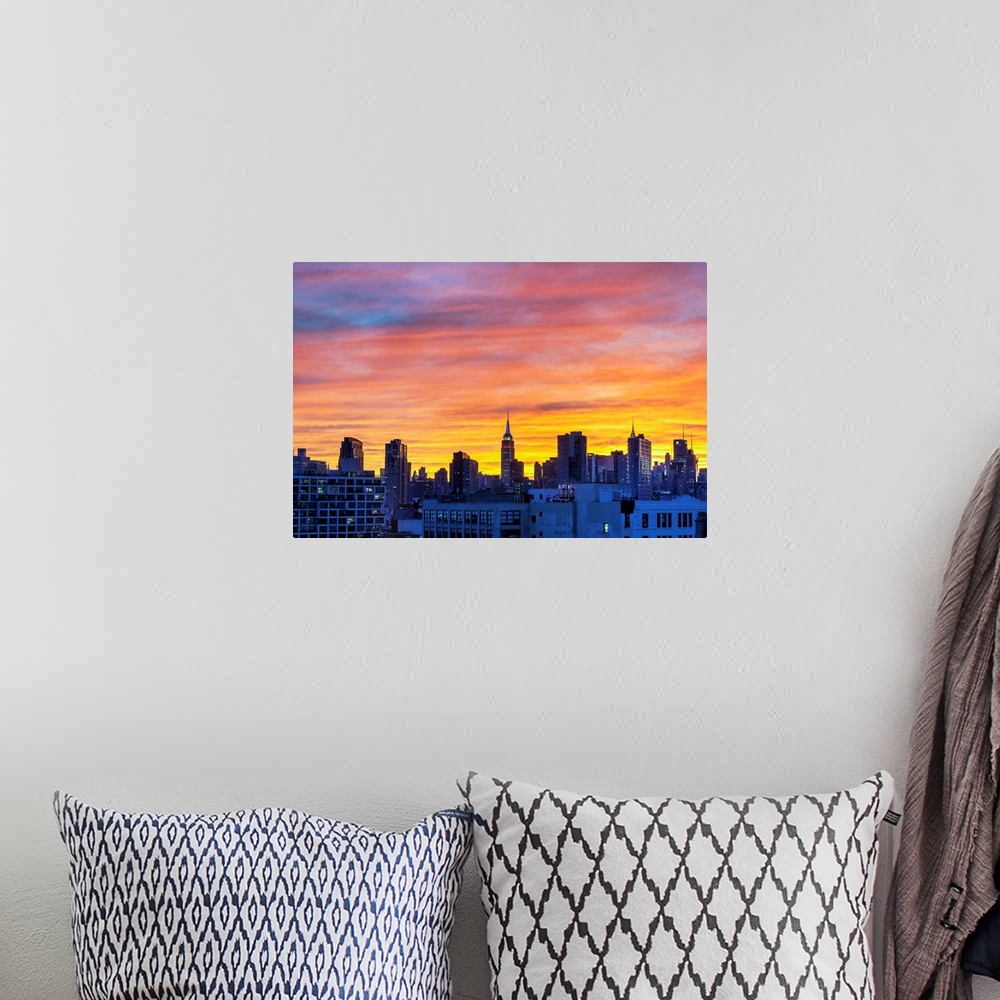 A bohemian room featuring New York, NYC, Manhattan Skyline, Empire State building, night.