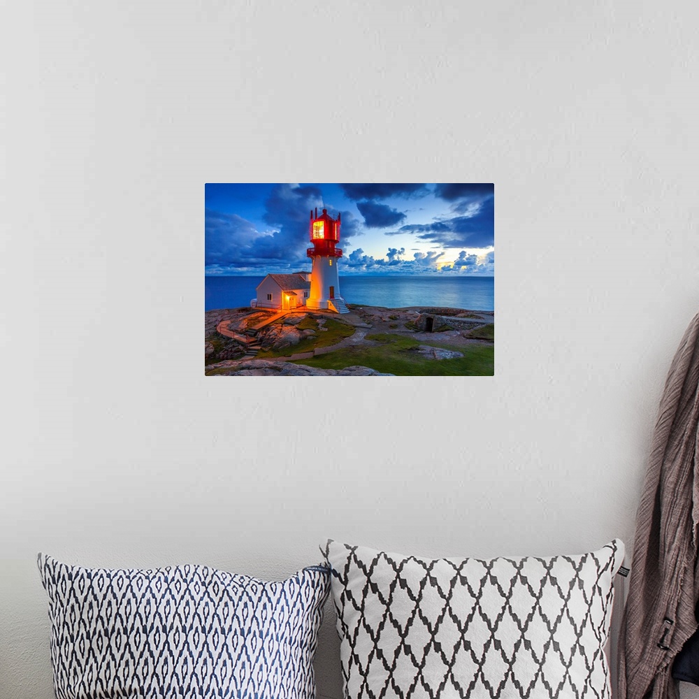 A bohemian room featuring Norway, Vest-Agder, Scandinavia, Lindesnes, Lindesnes Fyr Lighthouse at sunset.