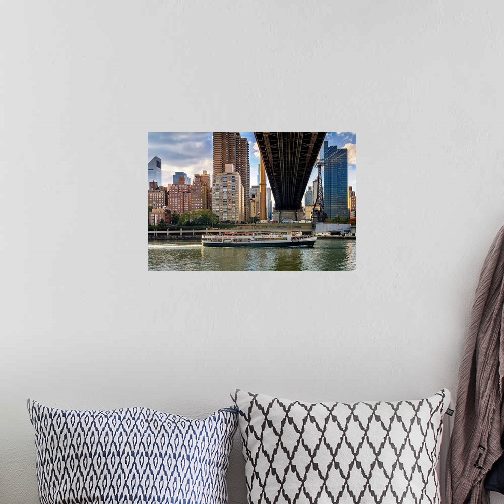 A bohemian room featuring New York, NYC, City skyline, Queensboro Bridge, cruise ship, viewed from Roosevelt Island.